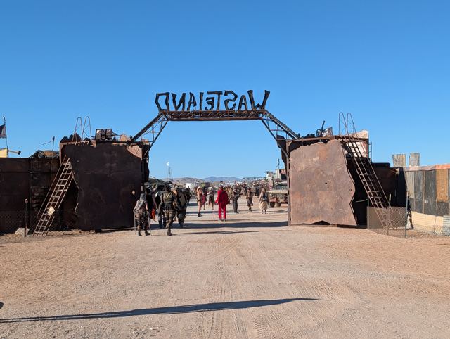 The Wasteland gate seen from inside town on a bright day.
