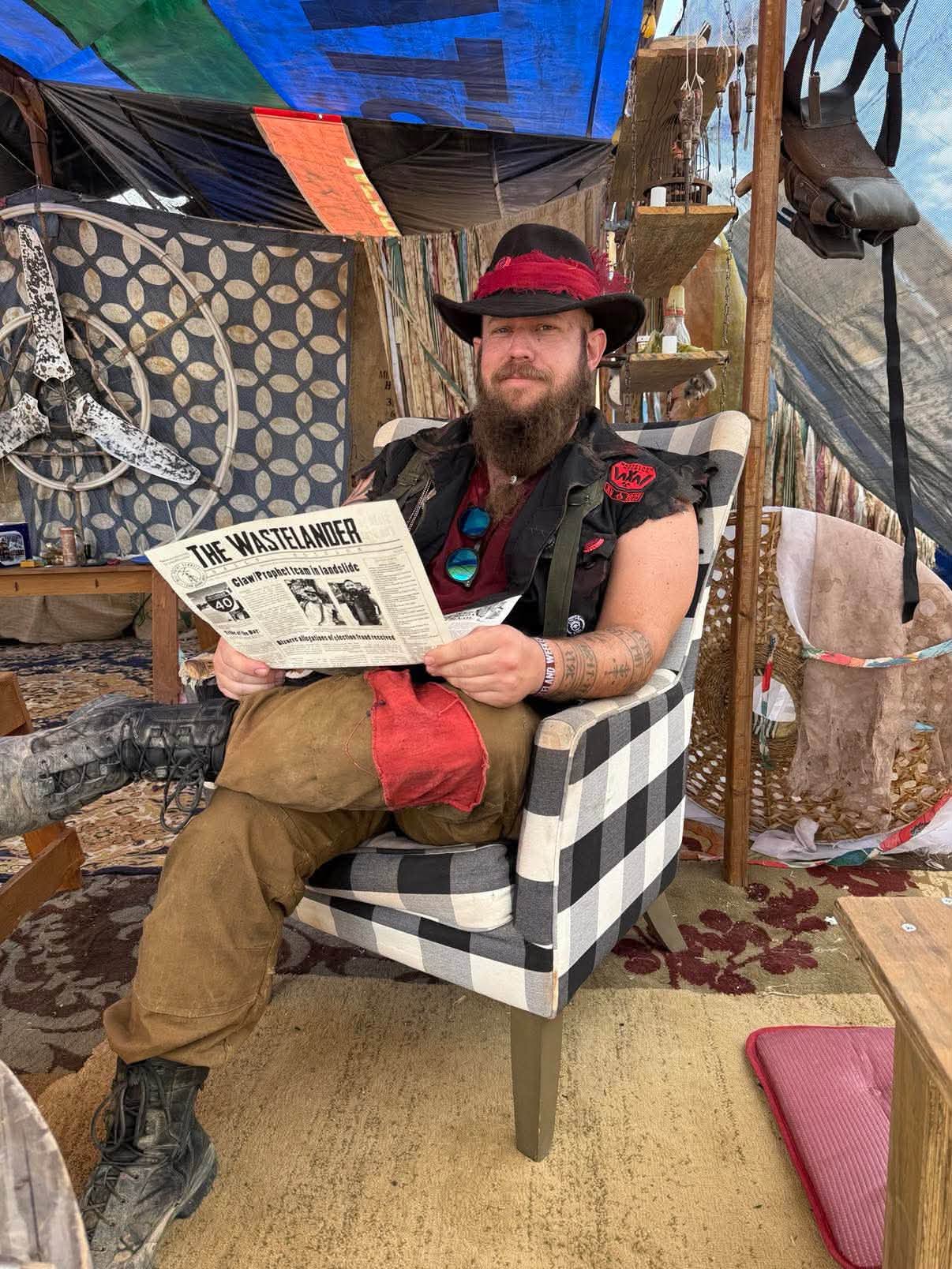Grandpa settled deep into the plaid armchair in the trading post, boots crossed, The Wastelander still open.